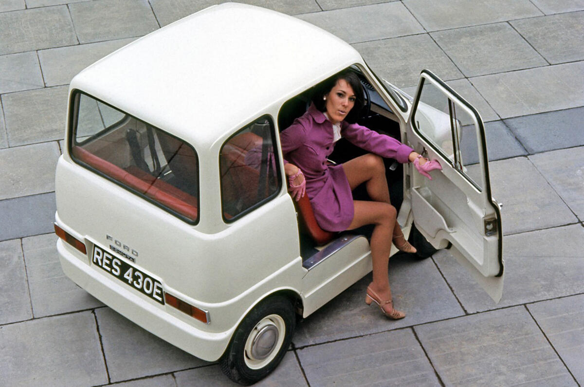 Women getting out of a Ford Comuta