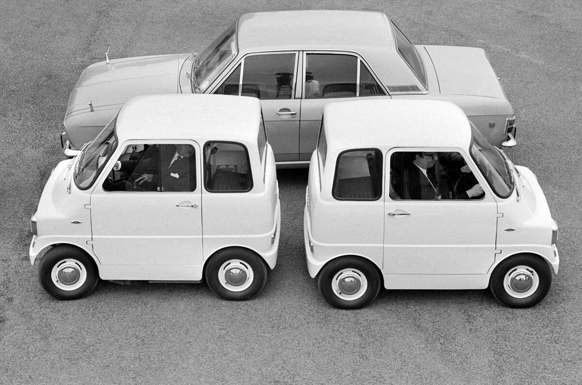 Two Ford Comutas and a Ford Cortina
