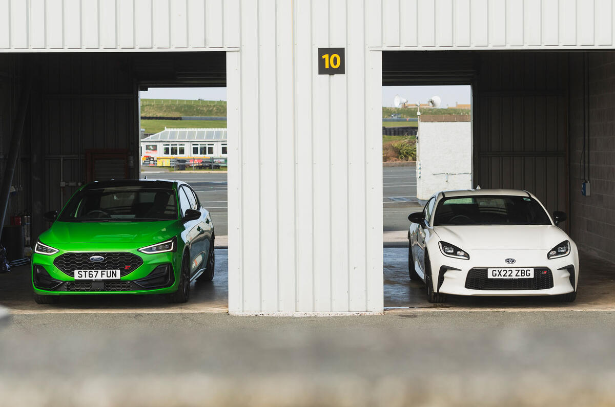 Ford Focus ST Track Pack vs Toyota GR86 in garage