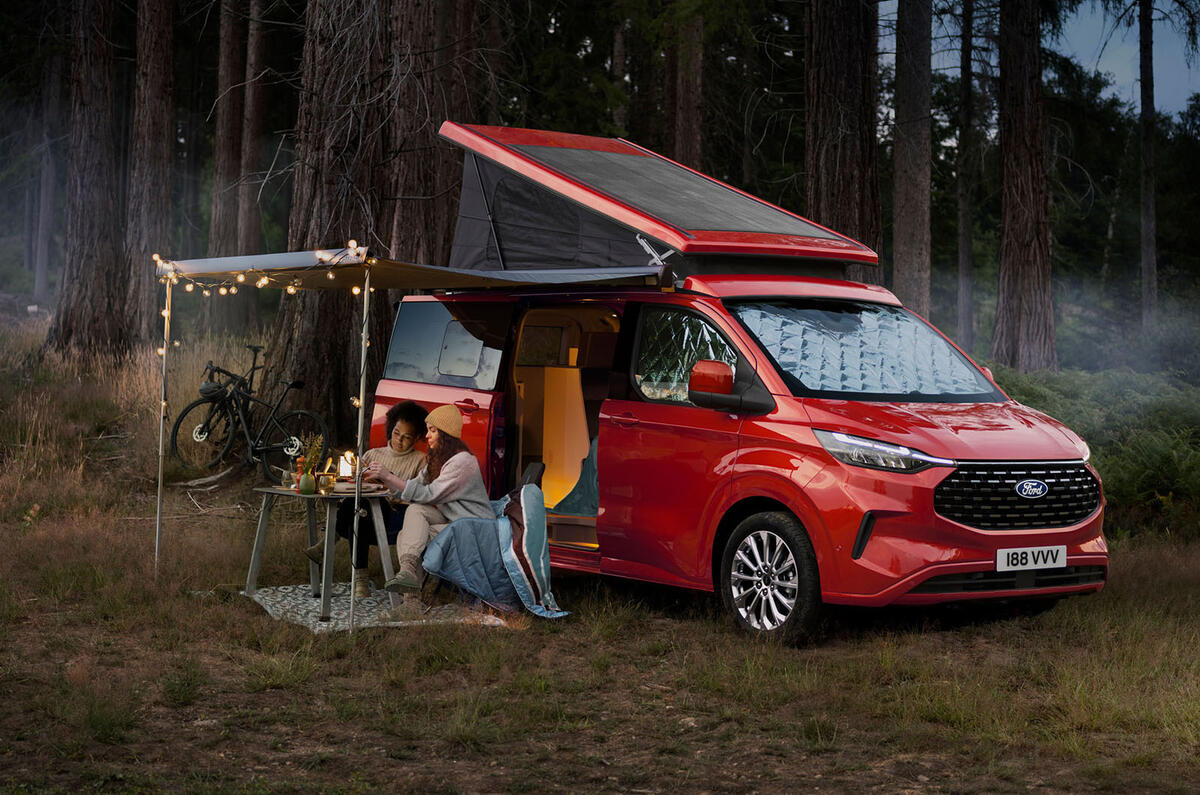 Ford Transit Custom Nugget with people sat outside  Ford Transit Custom Nugget with people sat outside