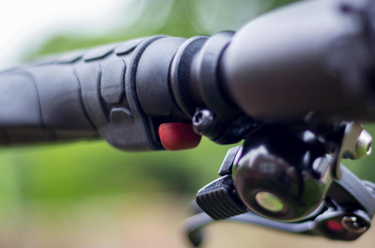 Gocycle G4's boost button is tucked away discretely on the handlebar