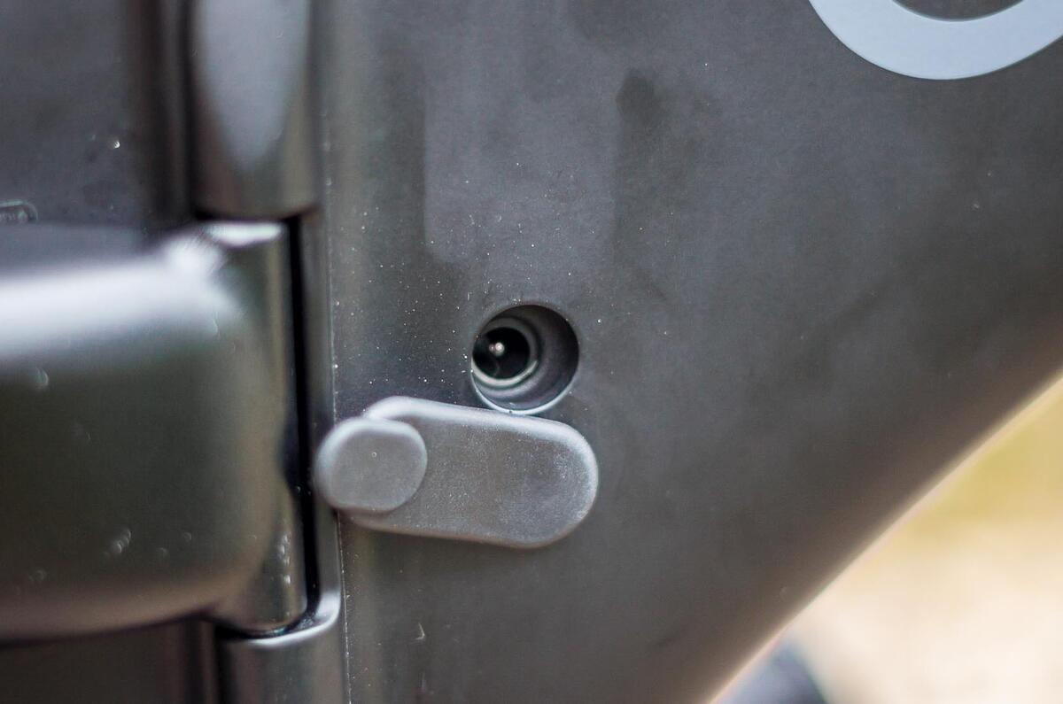 Gocycle G4 charge point is discrete; empty to full can take less than three hours