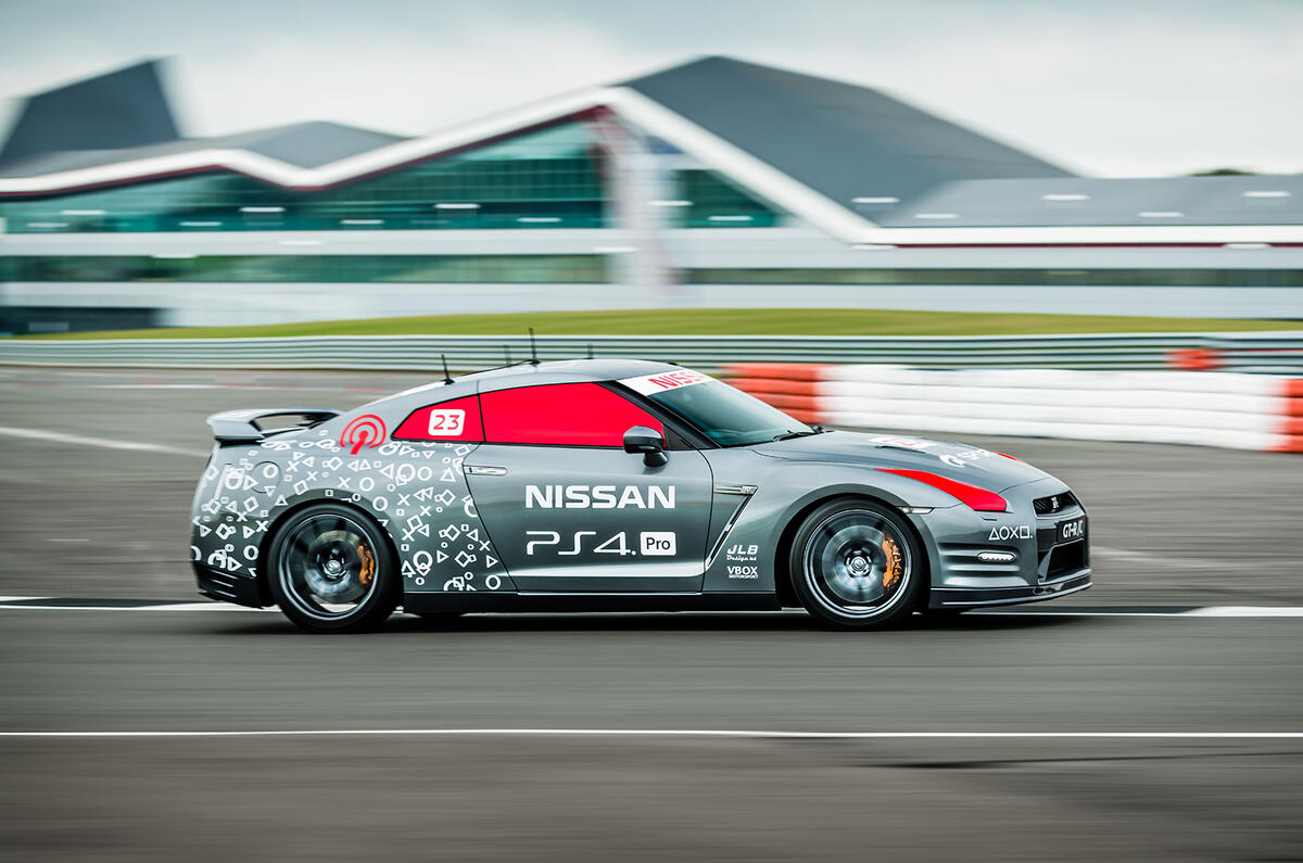 Driving the remote-controlled Nissan GT-R/C