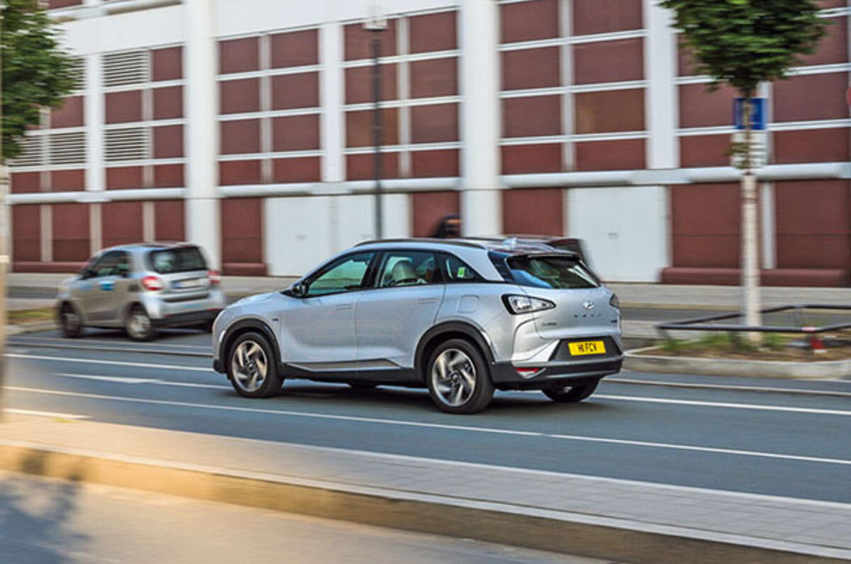 Nexo against red building