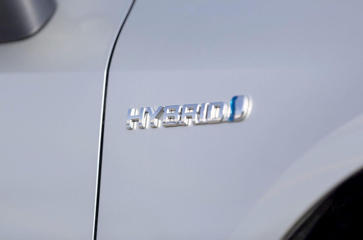 Hybrid badge toyota corolla side