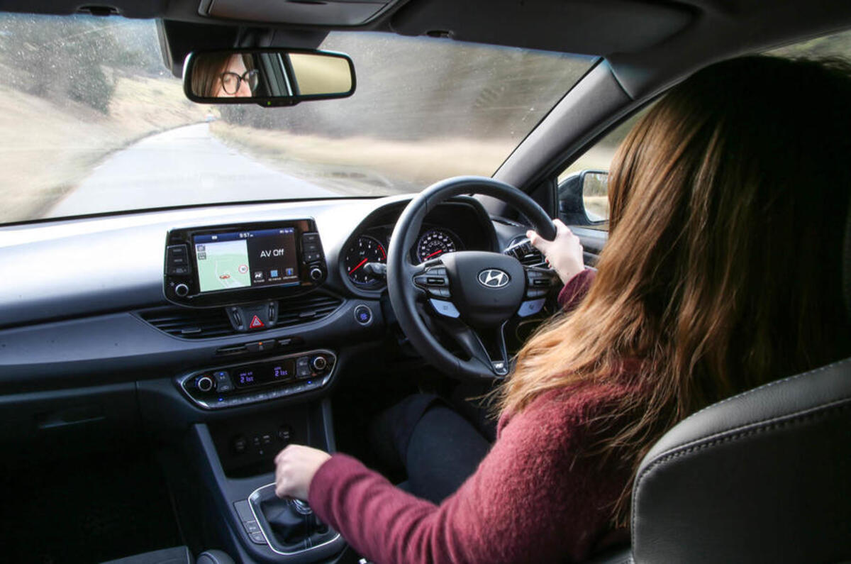 Volkswagen Golf GTI vs Hyundai i30n Rachel driving back seat