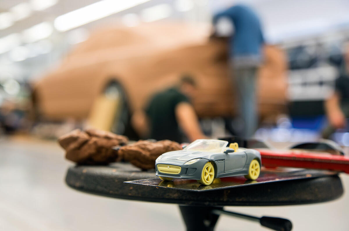 Clay modellers shape a secret car behind a 3D-printed F-Type