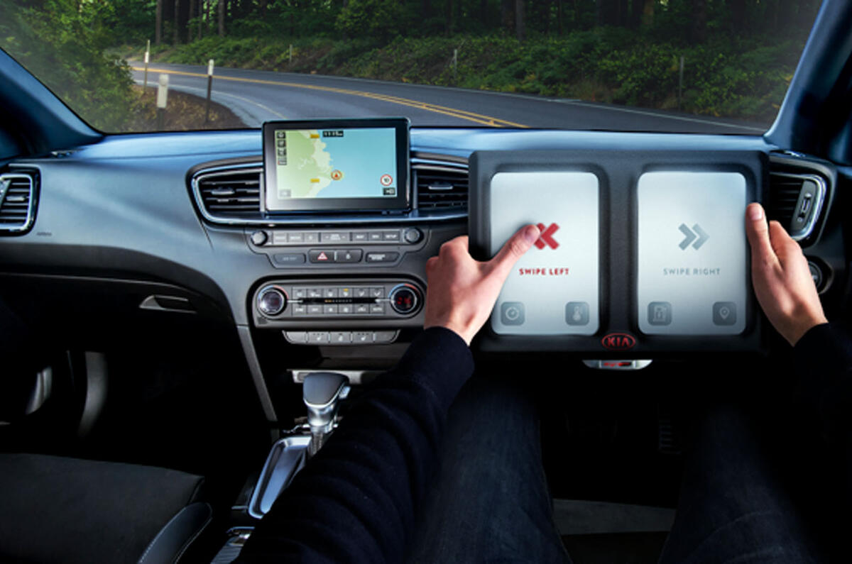 Kia Ceed interior with touchscreen steering wheel
