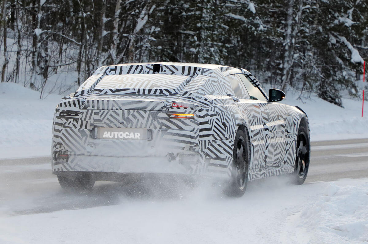 Jaguar 4dr GT Camo rear quarter tracking Jaguar 4dr GT Camo rear quarter tracking