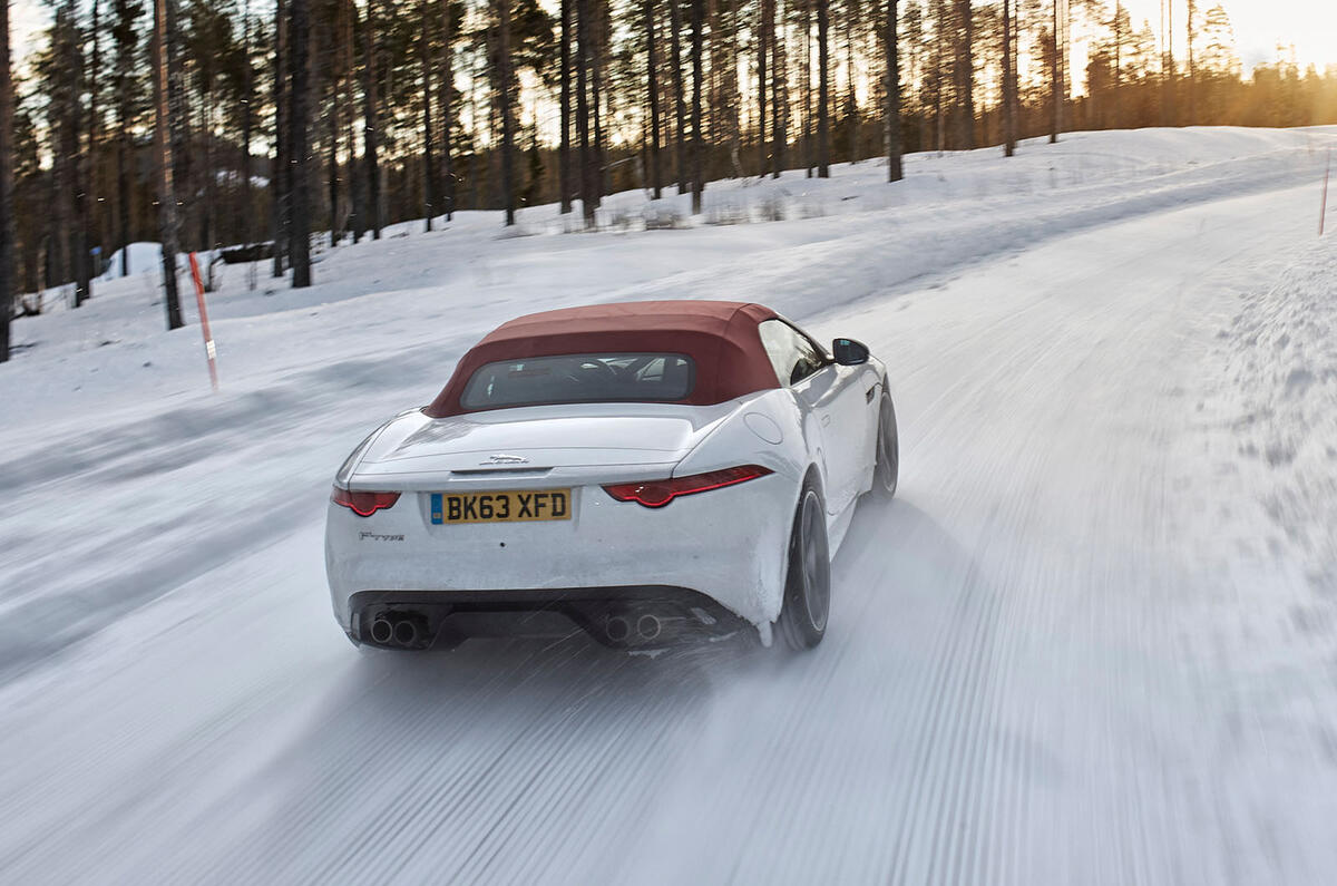 Jaguar F Type rear in snow Jaguar F Type rear in snow