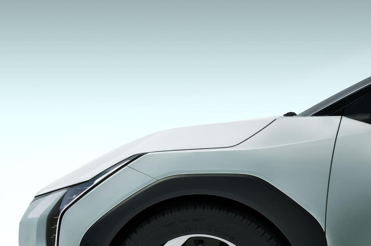 Kia EV4 teaser side front Kia EV4 teaser side front