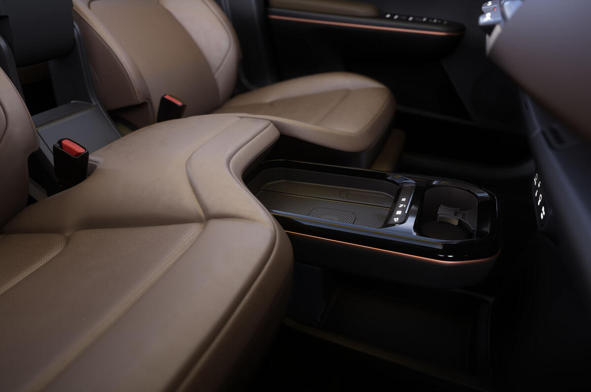 Kia EV5 in studio centre console and buddy seat Kia EV5 in studio centre console and buddy seat