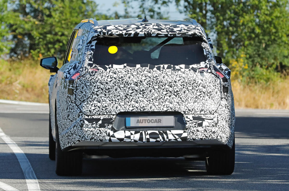 Kia EV9 rear driving 1