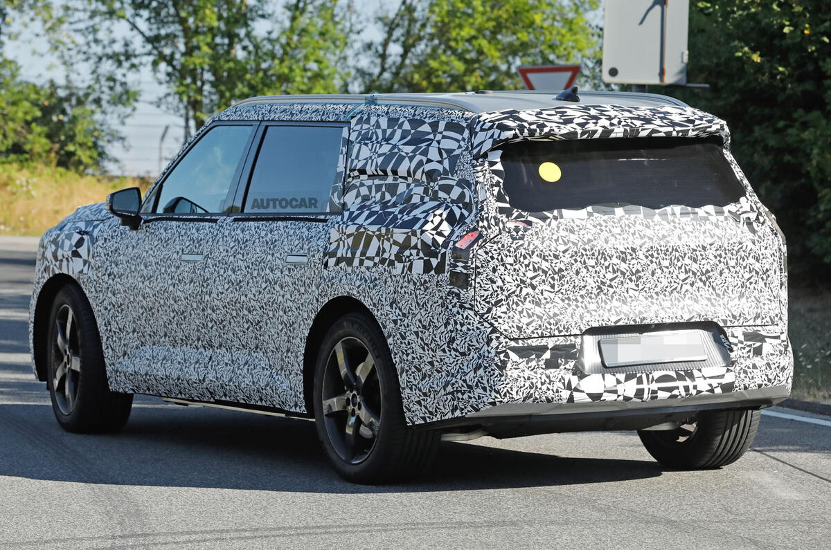 Kia EV9 rear side driving 1