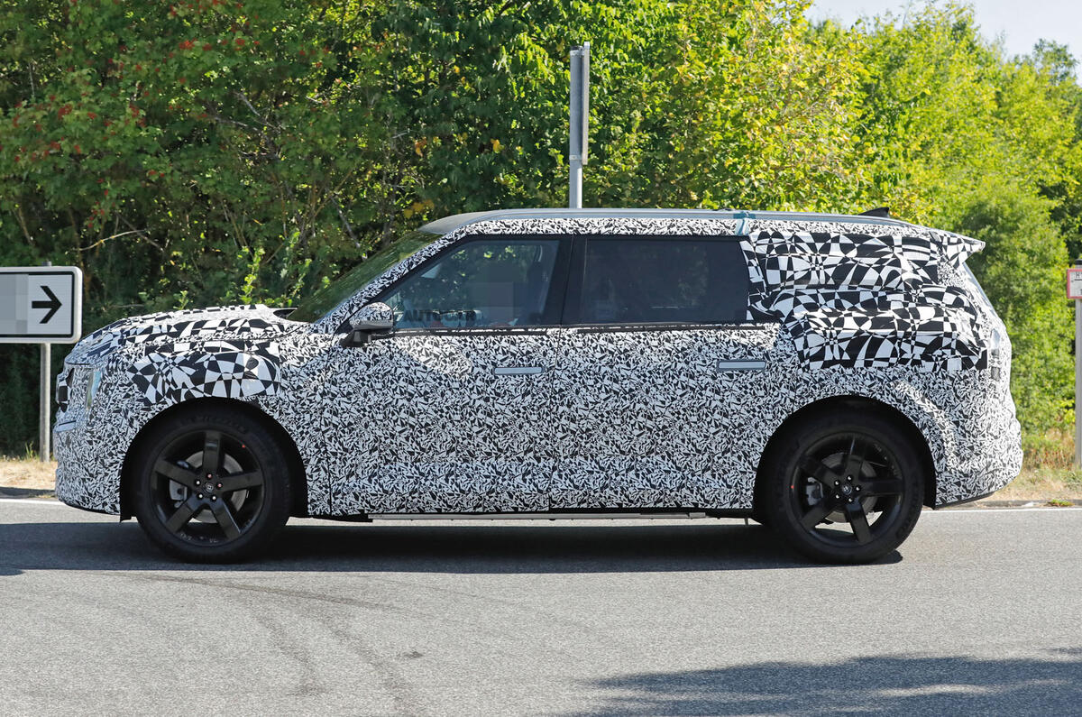 Kia EV9 side driving 1