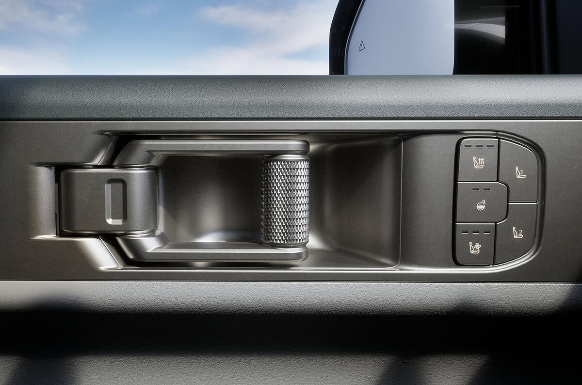 Kia Tasman review 2025 07 door pull Kia Tasman review 2025 07 door pull