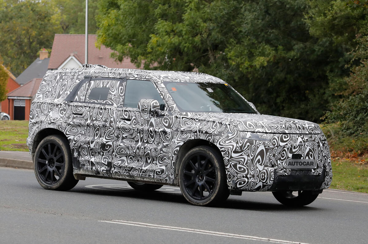 Land Rover Defender Sport camo sep 2025 front quarter tracking