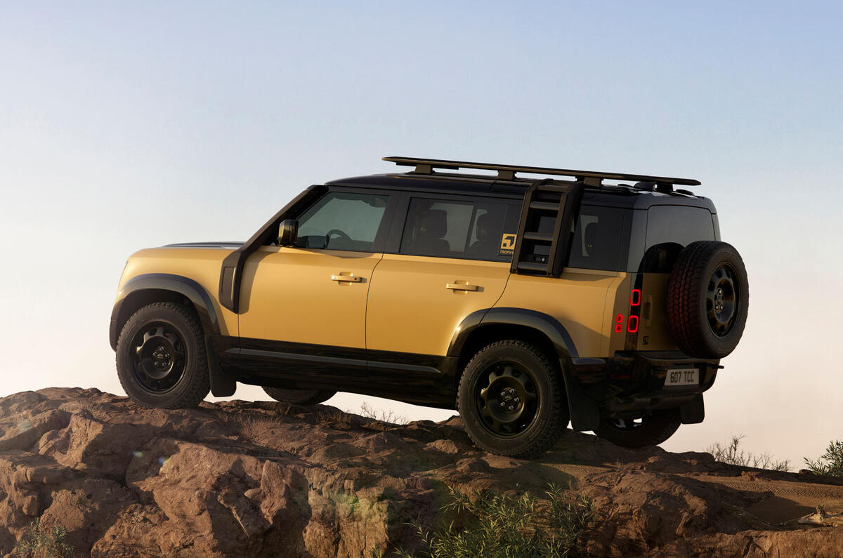 Land Rover Defender Trophy Edition yellow rear quarter static Land Rover Defender Trophy Edition yellow rear quarter static