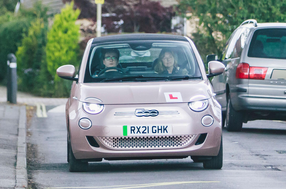 learner driver in fiat 500e front tracking
