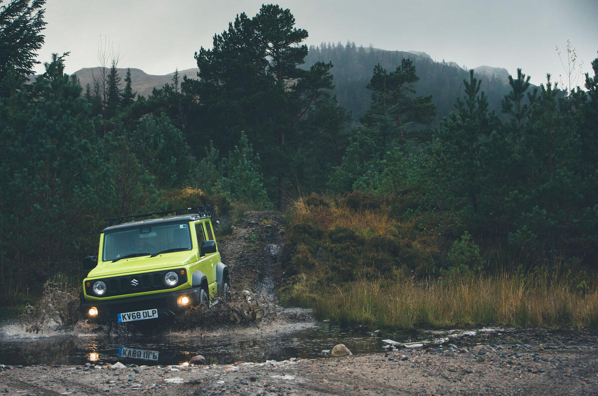 Christmas tree road trip in a Suzuki Jimny