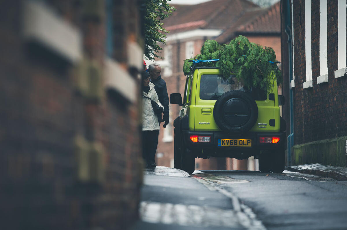 Christmas tree road trip in a Suzuki Jimny
