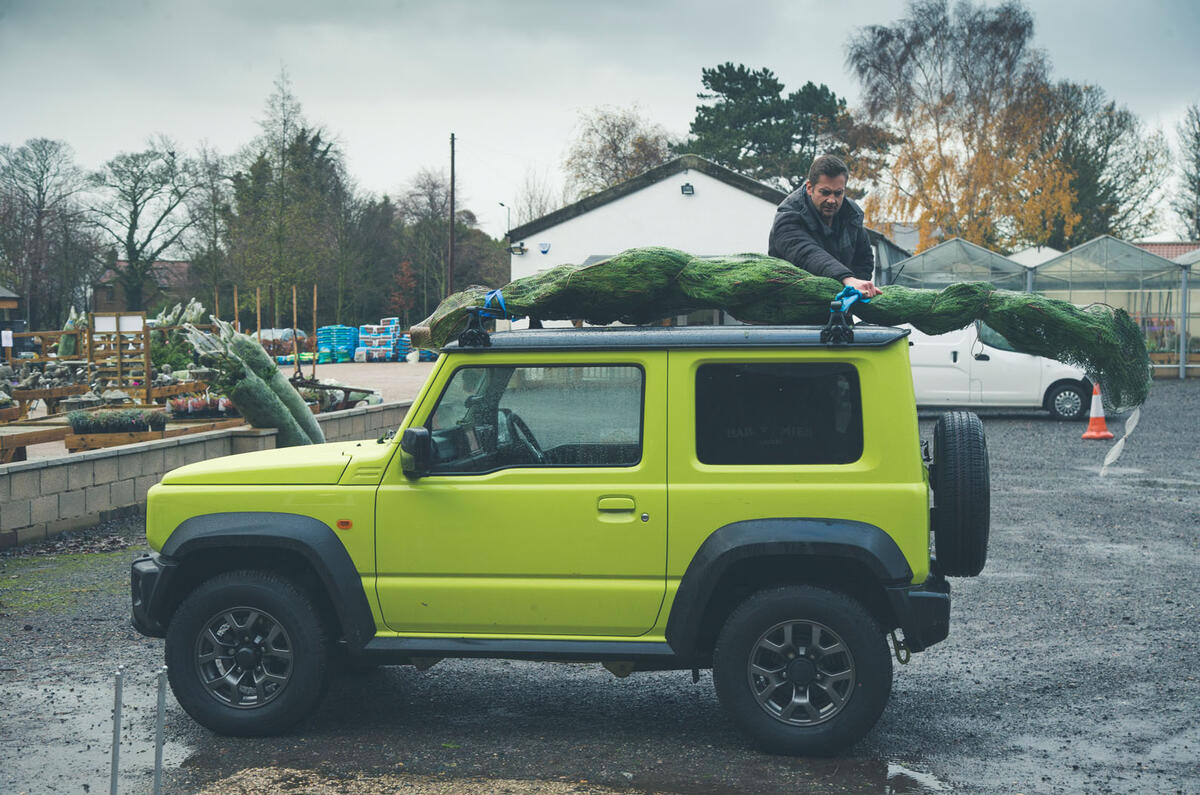 Christmas tree road trip in a Suzuki Jimny