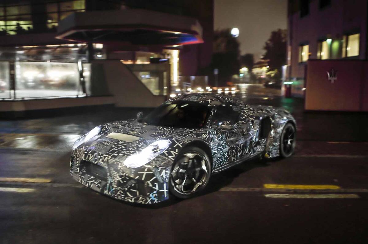 Maserati sports car test mule side front