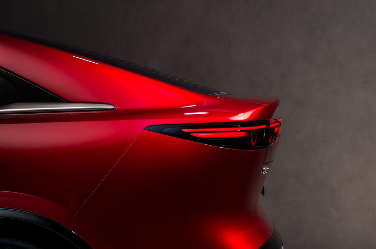 Mazda 6e 2026 rear spoiler down detail Mazda 6e 2026 rear spoiler down detail
