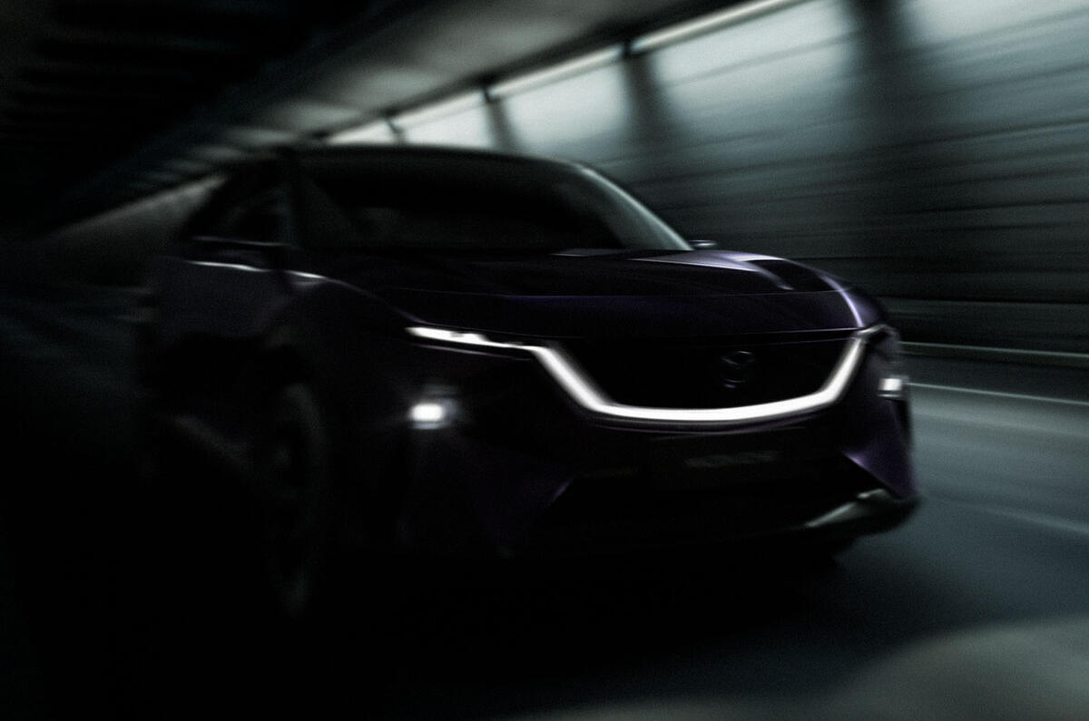 Mazda EZ 60 front quarter tracking dark Mazda EZ 60 front quarter tracking dark