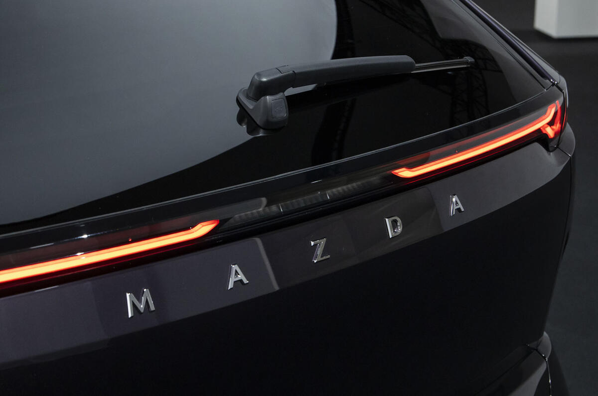 Mazda CX 6E rear badge