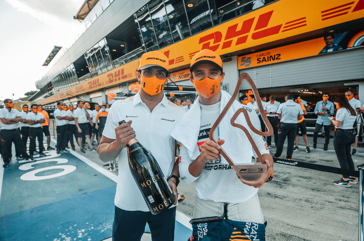 McLaren F1 drivers Lando Norris and Carlos Sainz celebrate their success
