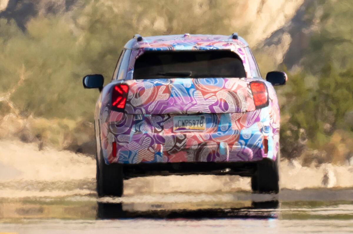 Mini Aceman camouflaged rear driving Mini Aceman camouflaged rear driving