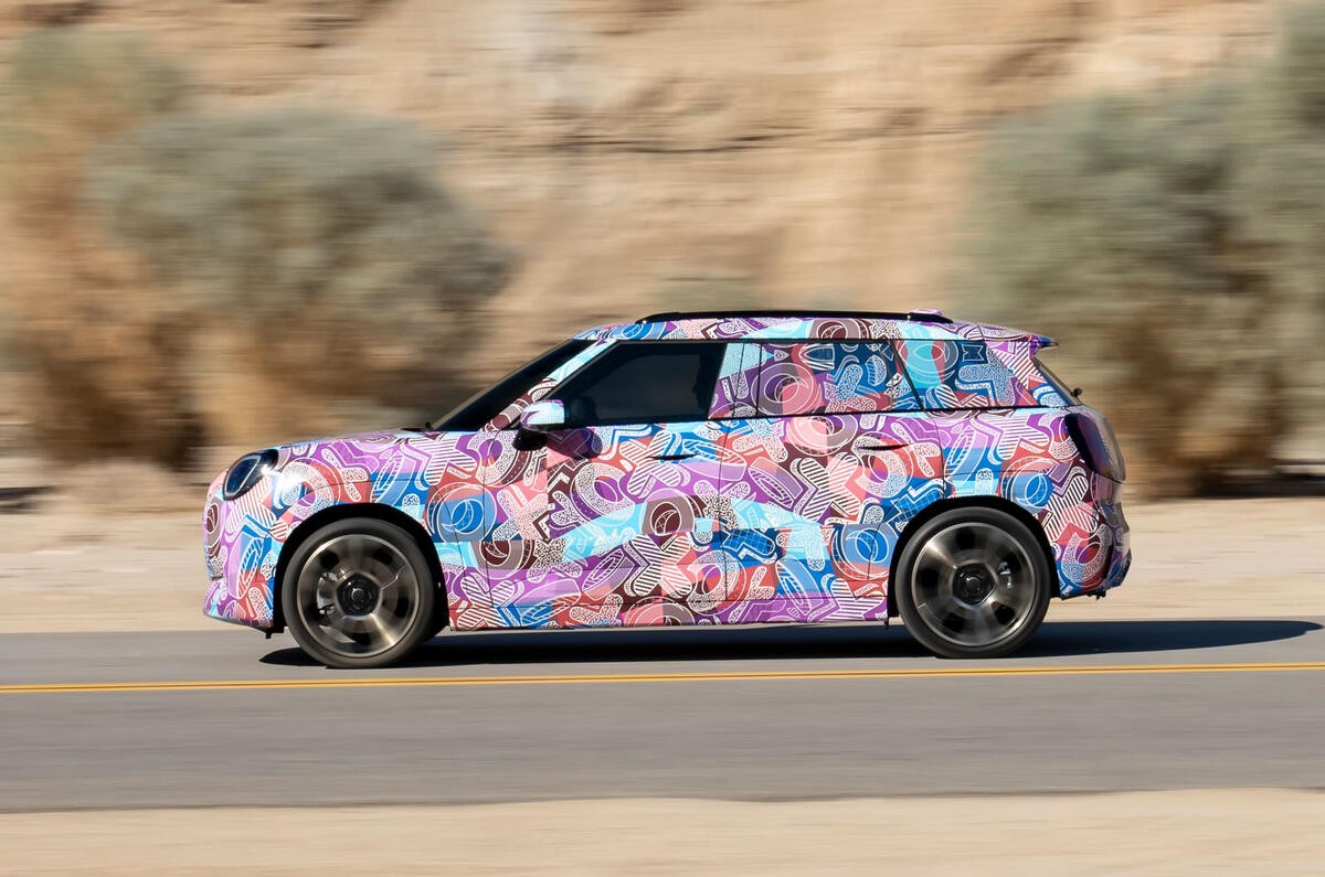 Mini Aceman camouflaged side driving Mini Aceman camouflaged side driving