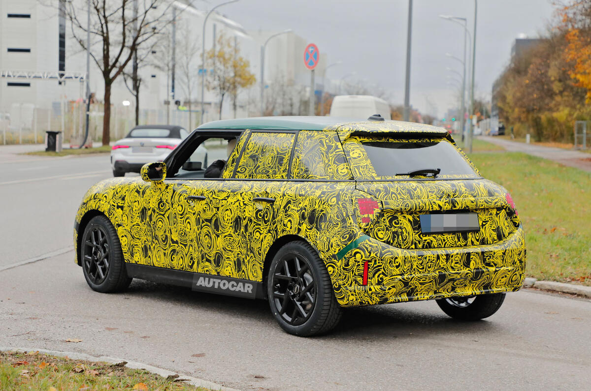 Mini Cooper 5dr 2024 camouflage rear quarter tracking