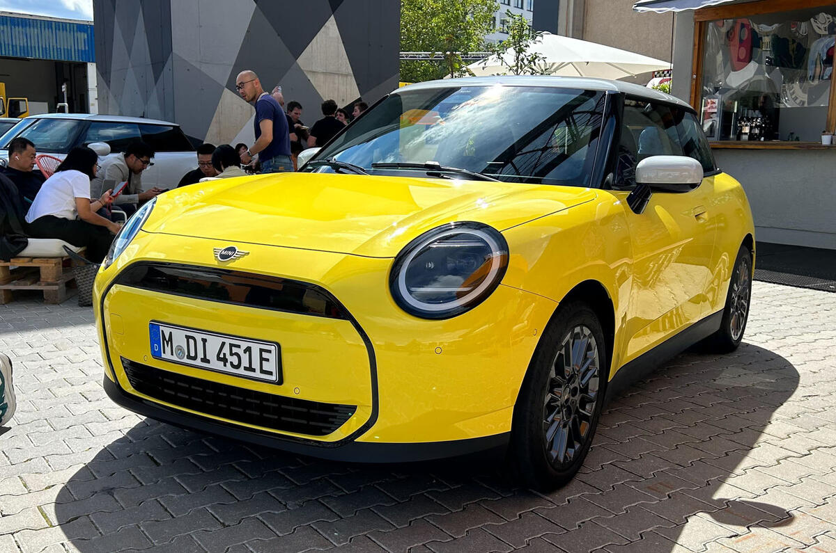 Mini Cooper Electric 2024 yellow front quarter