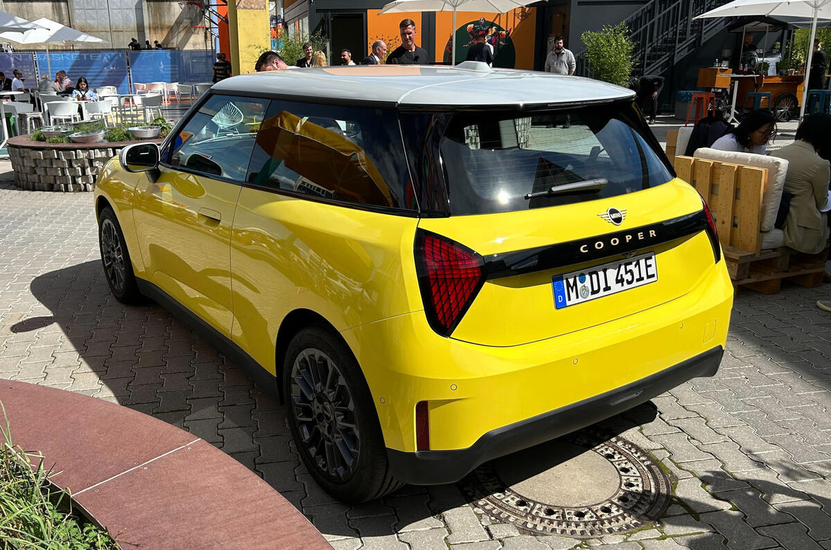 Mini Cooper Electric 2024 yellow rear quarter Mini Cooper Electric 2024 yellow rear quarter