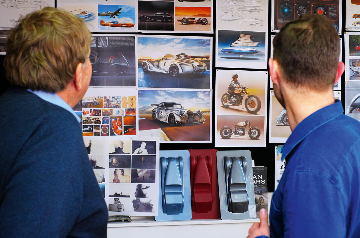 Wells (on right) shows Cropley some of his Morgan-based ideas