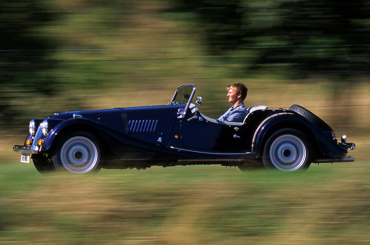 Morgan Plus 4 on the road side