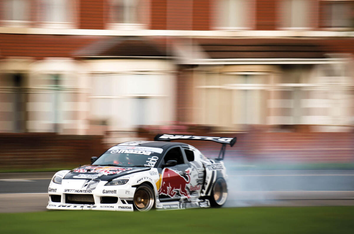 Drifting around a five-roundabouts-in-one junction with drift ace Mike Whiddett