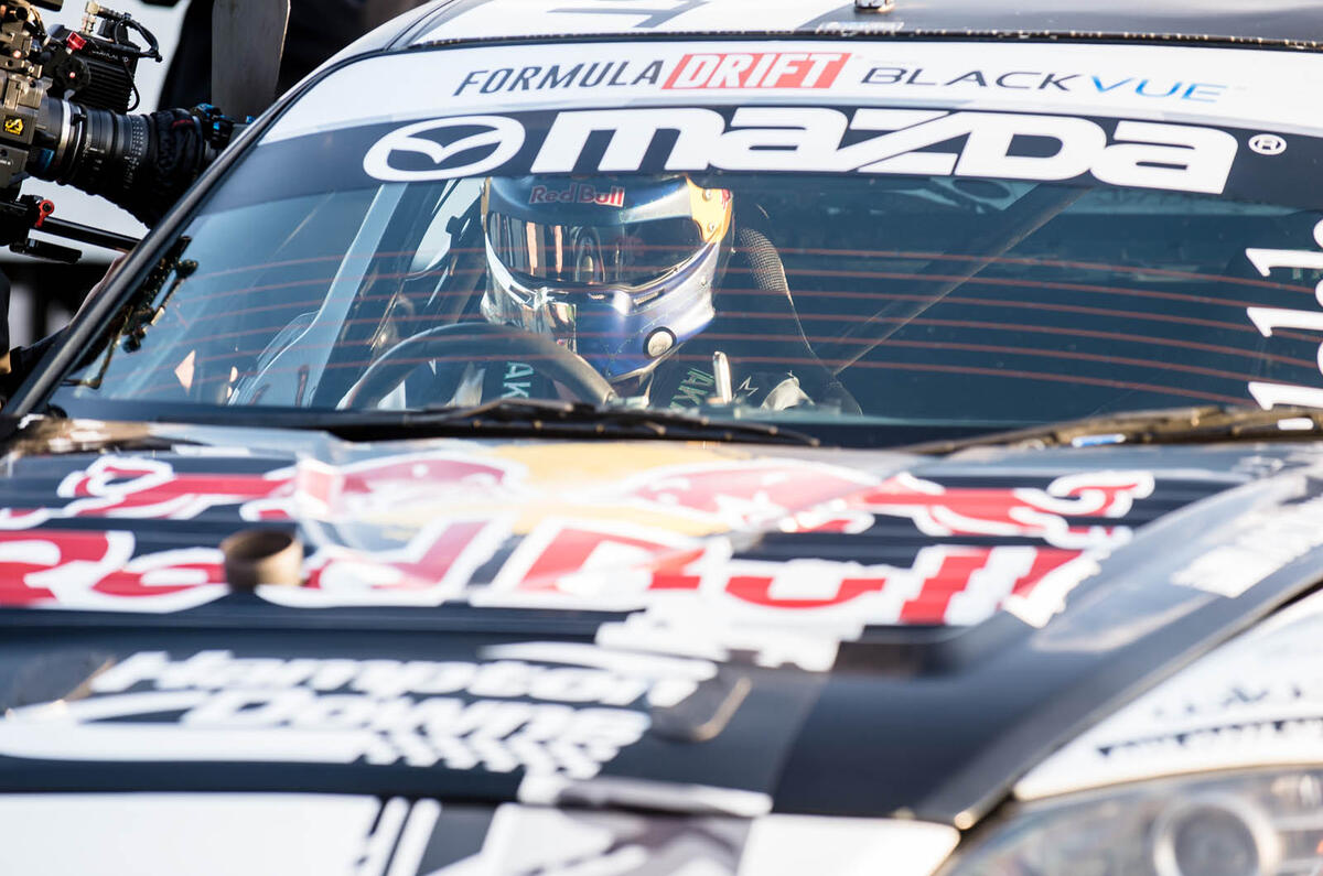 Drifting around a five-roundabouts-in-one junction with drift ace Mike Whiddett