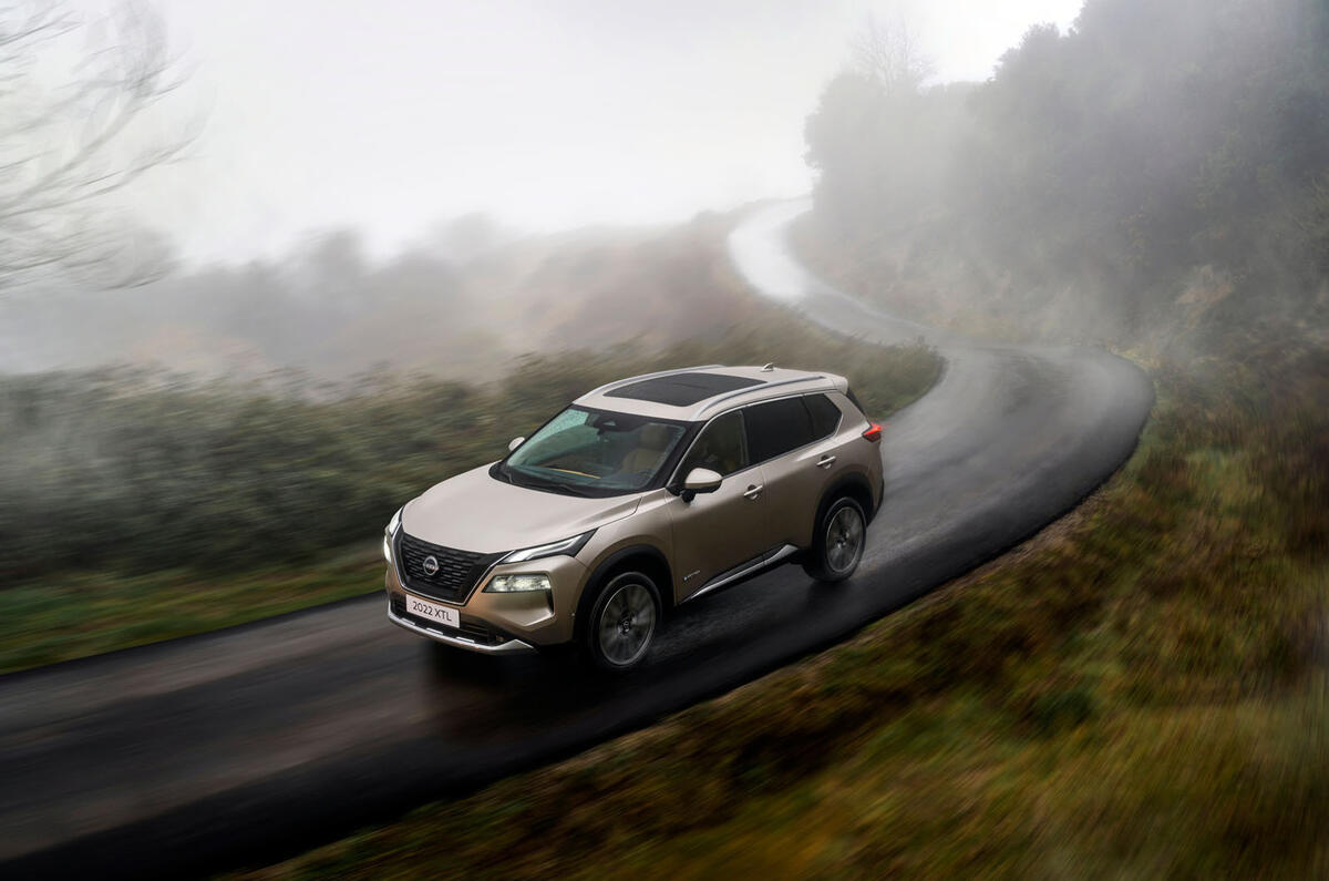 Nissan X Trail 2022 front quarter tracking rain Nissan X Trail 2022 front quarter tracking rain