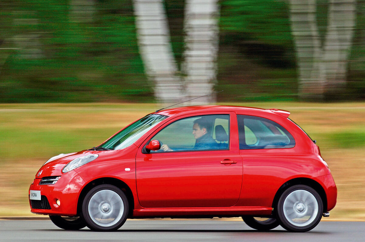 Nissan Micra at speed - side