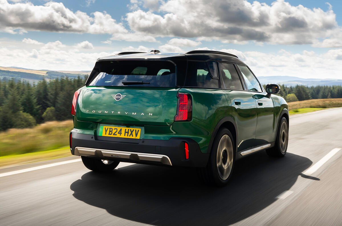 MINI Countryman driving rear three quarters MINI Countryman driving rear three quarters