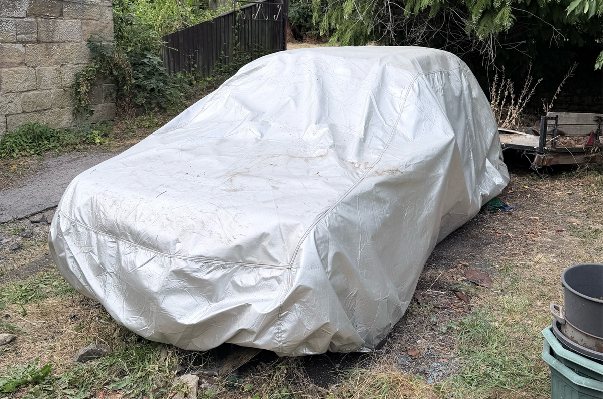Peugeot 205 GTI under cover