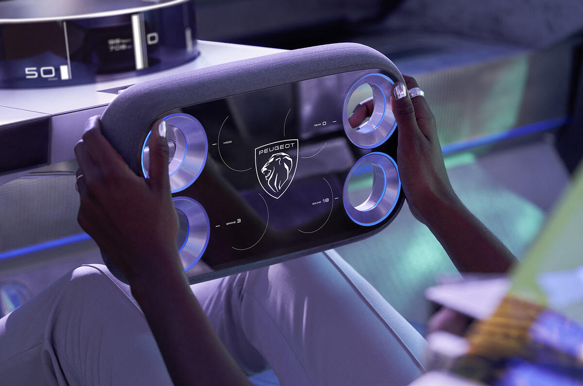 Peugeot Inception Concept hands on the wheel