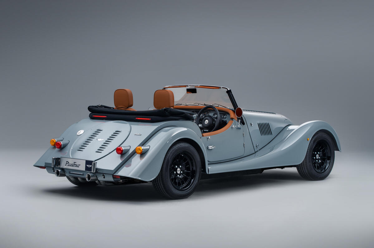 Plus Four rear three quarters roof down Plus Four rear three quarters roof down