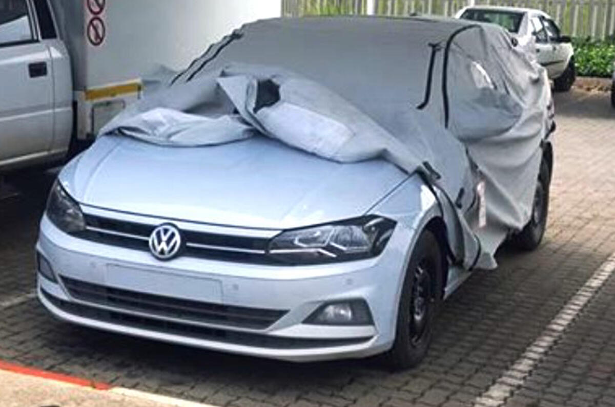 Volkswagen Polo with cover partly on Volkswagen Polo