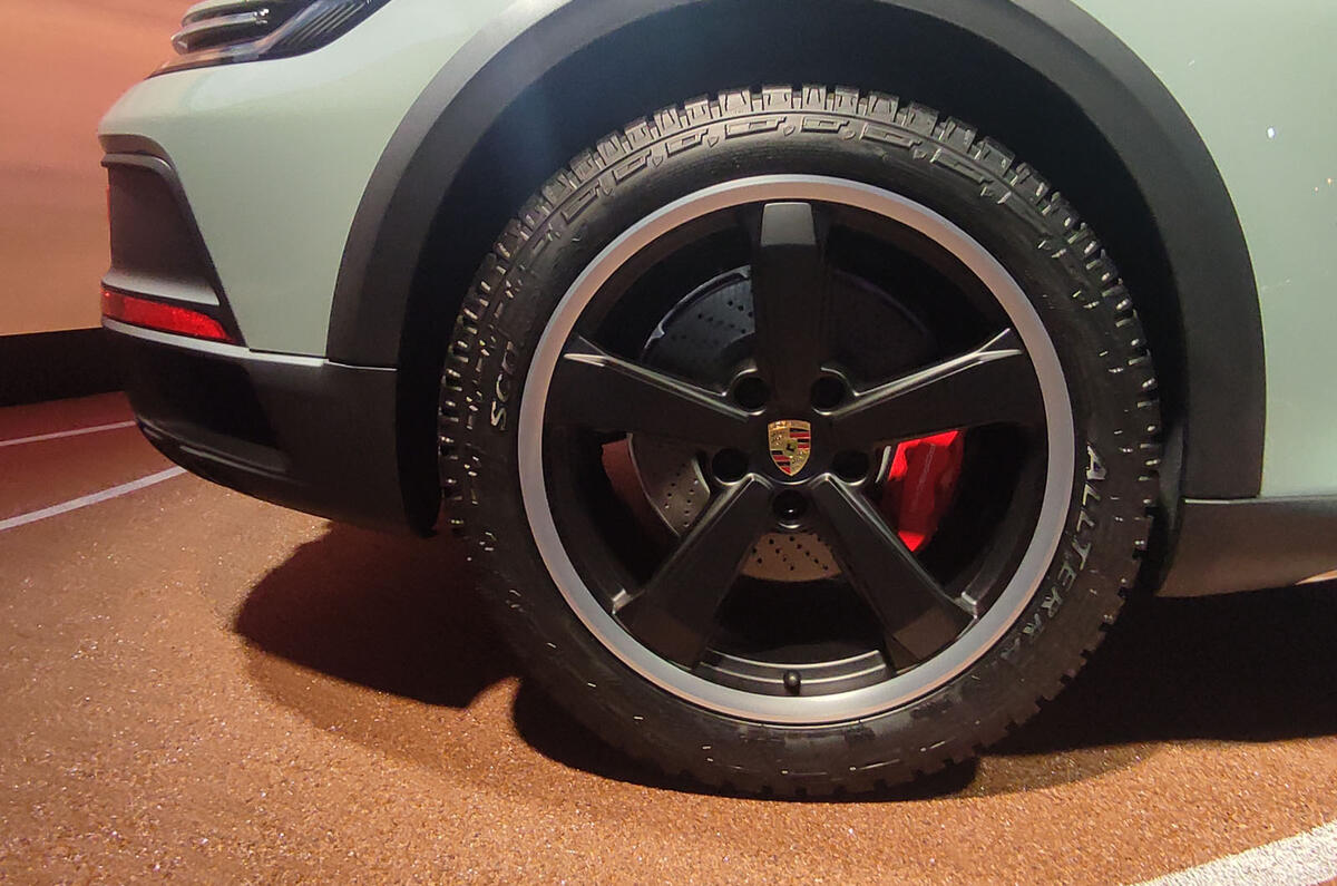 Porsche 911 dakar on show at los angeles rear wheel Porsche 911 dakar on show at los angeles rear wheel