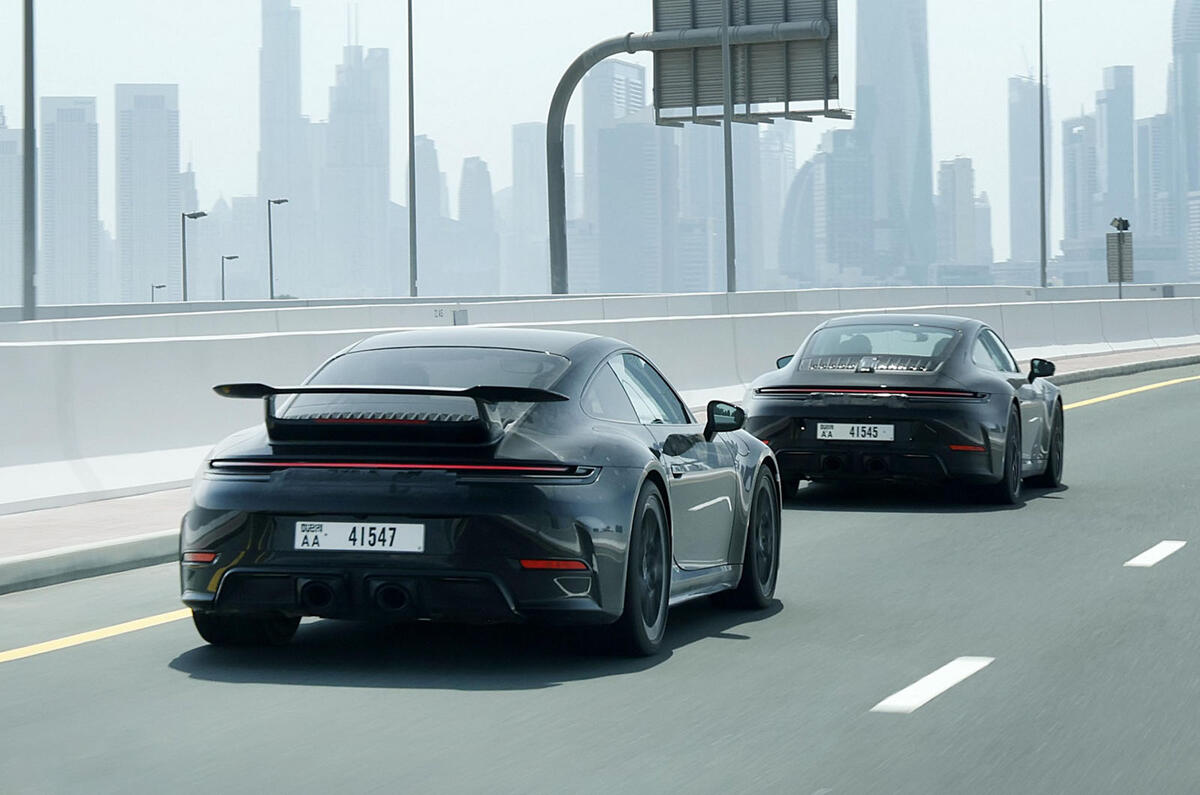 Porsche 911 hybrid prototype testing in city