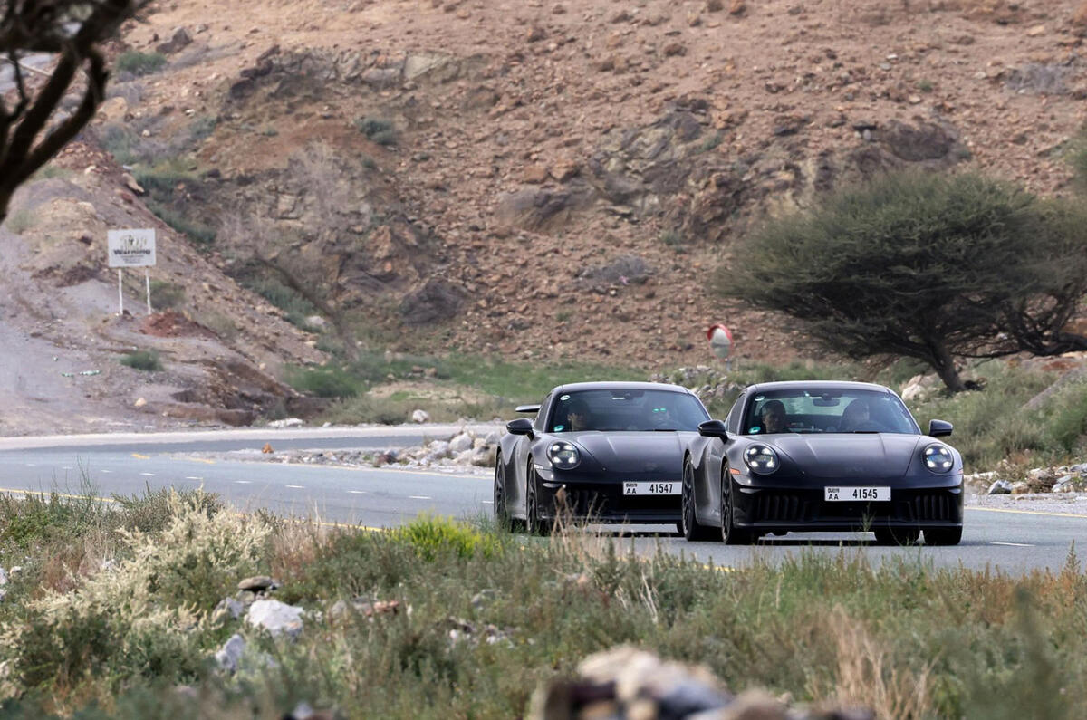 Porsche 911 hybrid prototype testing on mountain road